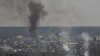 El humo y la suciedad se elevan desde la ciudad de Severodonetsk durante los combates entre las tropas ucranianas y rusas en la región de Donbás, en el este de Ucrania, el 14 de junio de 2022, en medio de la invasión rusa de Ucrania. (Foto de ARIS MESSINIS / AFP)
