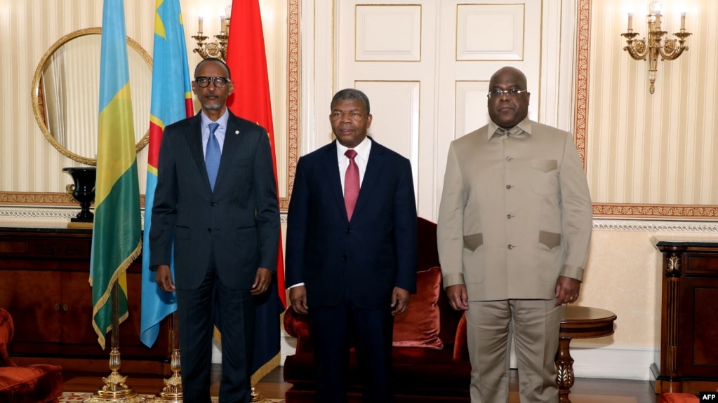 FILE — Rwanda's President Paul Kagame meets with his Congolese counterpart Felix Tshisekedi and Angola's President Joao Lourenco, at the Great Lakes International Conference, in Luanda, Angola, on July 6, 2022. 