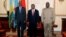 Rwanda President Paul Kagame, left, Angola President Joao Lourenco, center, and Democratic Republic of Congo President Felix Tshisekedi pose for a photograph in Luanda, Angola, on July 6, 2022, as they meet for talks after an upsurge in violence in eastern DRC. 