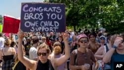 Abortion-rights protesters demonstrate outside the Supreme Court in Washington, June 25, 2022. 