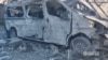 A view shows a damaged vehicle, as Russia's invasion of Ukraine continues, in Bakhmut, Donetsk Oblast, Ukraine in this still image obtained from a social media video released on July 2, 2022. National Police of Ukraine/Handout via REUTERS