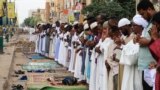 FILE: Sudanese gather to pray in the capital Khartoum on the Eid al-Adha holiday, which took place in 2022 on July 9.