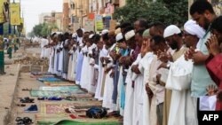 FILE: Sudanese gather to pray in the capital Khartoum on the Eid al-Adha holiday, which took place in 2022 on July 9.
