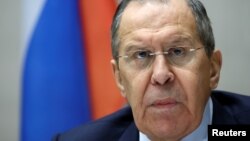 FILE: Russian Foreign Minister Sergei Lavrov looks into the camera during a news conference after his meeting with U.S. Secretary of State Antony Blinken about tensions over Ukraine, in Geneva, Switzerland,. Taken 1.21.2022