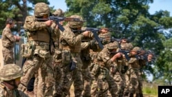 New recruits to the Ukrainian army are trained by U.K. army specialists at a military base near Manchester, England, July 7, 2022.