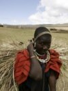 FILE - A Maasai woman walks in the Ngorongoro Conservation Area in Tanzania in August 2007.