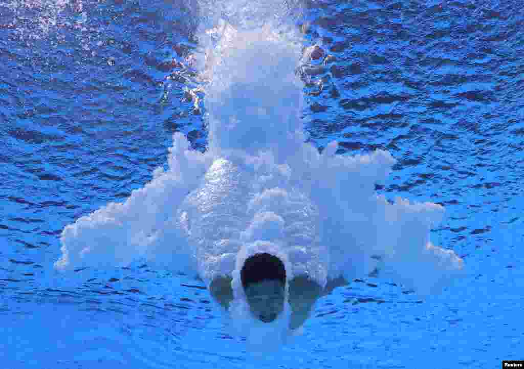 Jian Yang of China competes in the men&#39;s 10m platform diving final during the FINA World Championships at the Duna Arena in Budapest, Hungary.