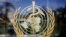 FILE - The logo of the World Health Organization is seen at the WHO headquarters in Geneva, Switzerland, June 11, 2009. 