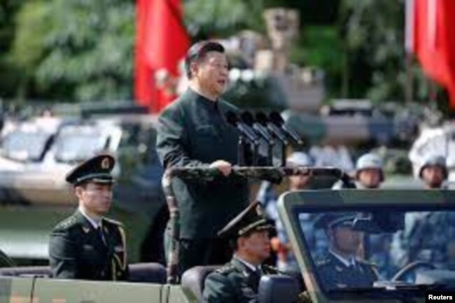 Çin Devlet Başkanı Xi Jinping Pekin'in Hong Kong'u İngiltere'den devralmasının yıldönümü görenlerinde