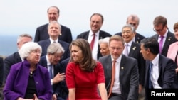 
Canada's Finance Minister Chrystia Freeland and , U.S. Treasury Secretary Janet Yellen, left, , talk as they gather to pose for a photo during the G7 Summit in Koenigswinter, Germany on May 19, 2022.