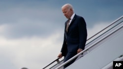 President Joe Biden arrives at Andrews Air Force Base after delivering remarks in Cleveland about the American Recovery Act, July 6, 2022, in Andrews Air Force Base, Maryland.