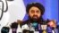 FILE - Taliban Foreign Minister Amir Khan Muttaqi speaks during a news conference in Kabul, Afghanistan, Sept. 14, 2021. Muttaqi urged the United States again, July 26, 2022, to lift sanctions and 'unconditionally' release some $7 billion in frozen Afghan central bank funds.