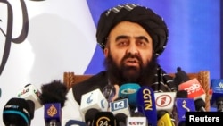 FILE - Taliban Foreign Minister Amir Khan Muttaqi speaks in Kabul, Afghanistan.