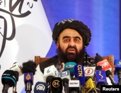 FILE - Taliban Foreign Minister Amir Khan Muttaqi speaks during a news conference in Kabul, Afghanistan, Sept. 14, 2021.