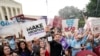 A celebration outside the Supreme Court, Friday, June 24, 2022, in Washington. The Supreme Court has ended constitutional protections for abortion that had been in place nearly 50 years - a decision by its conservative majority to overturn the court's lan