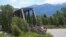 A collapsed train bridge is shown along the Yellowstone River, June 15, 2022, near Livingston, Montana.
