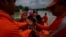National Disaster Response Force (NDRF) personnel rescue flood-affected villagers in Korora village, west of Gauhati, India, June 17, 2022. 