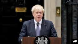 PM Inggris Boris Johnson saat mengumumkan pengunduran dirinya hari Kamis (7/7). 