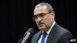 FILE - Ramiz Alakbarov, the deputy special representative of the U.N. secretary-general as resident and humanitarian coordinator, speaks during a press conference in Kabul, July 11, 2021.