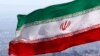 Bendera nasional Iran dengan lambang Republik Islam Iran (foto: dok). 