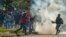 Demonstrators clash with riot police in the El Arbolito park area in Quito, June 22, 2022, on the 10th consecutive day of Indigenous-led protests against the Ecuadorean government.