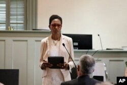 Renee Price, chair of the Orange County, N.C., Commissioners, speaks to an audience inside an historic courtroom in Hillsborough, N.C., Friday, June 17, 2022.