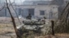 FILE - A Ukrainian tank is in position during heavy fighting on the front line in Sievierodonetsk, the Luhansk region, Ukraine, June 8, 2022.