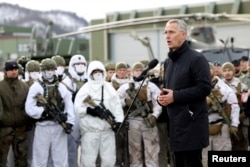 FILE - NATO Secretary-General Jens Stoltenberg addresses the troops as part of a military exercise called "Cold Response 2022," gathering around 30,000 troops from NATO member countries plus Finland and Sweden, amid Russia's invasion of Ukraine, at a base in Bardufoss in the Arctic Circle, Norway, March 25, 2022.