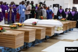 FILE - Coffins are pictured during a June 17, 2022, memorial service for victims killed during an attack by gunmen during a June 5 mass at St. Francis Catholic Church, in Owo, Ondo, Nigeria.