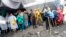 Hindu devotees are seen stranded after a cloudburst near the base camp of the holy cave shrine of Amarnath in south of Kashmir Himalayas, in India, July 8, 2022. 
