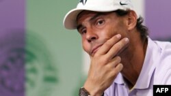 Spain's Rafael Nadal holds a press conference at the All England Club in Wimbledon, southwest London, on July 7, 2022, to announce his withdrawal from the tournament because of an injury.