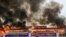 Smoke rises from a burning pile of seized illegal drugs during a destruction ceremony to mark the United Nations' "International Day against Drug Abuse and Illicit Trafficking" in Yangon, Myanmar, June 26, 2022. 