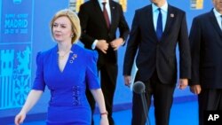 La ministre britannique des Affaires étrangères, Liz Truss, arrive au sommet de l'OTAN à Madrid, en Espagne, le mercredi 29 juin 2022. 