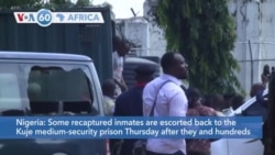 VOA60 Africa- Some recaptured inmates are escorted back to the Kuje medium-security prison Thursday in Nigeria after Tuesday's attack
