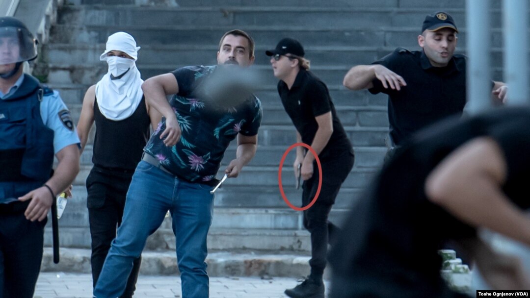 Rally in Skopje, second armed man with a gun