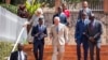 FILE: Britain's then-Prince Charles, center, and Camilla, then-Duchess of Cornwall, above-left, arrive at the Genocide Memorial in Kigali, Rwanda, June 22, 2022, ahead of a 54-nation Commonwealth summit.