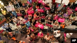 South Carolina House Rep. Gilda Cobb-Hunter is confronted by protesters who support more abortion restrictions as she speaks to protestors upset at the recent U.S. Supreme Court ruling removing protections for abortions on June 28, 2022, in Columbia, SC.