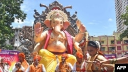 FILE - A 21-foot idol of the Hindu God Ganesh, made for United Indians of South Australia, is seen in Chinchpokli, India, before it is shipped to Adelaide, Australia, June 13, 2022 .