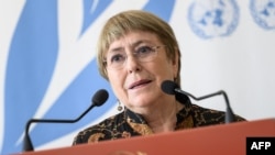 FILE - UN High Commissioner for Human Rights Michelle Bachelet addresses the press on the opening day of the 50th session of the UN Human Rights Council, in Geneva on June 13, 2022.