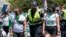 Abortion-rights activists demonstrating against the Supreme Court decision to overturn Roe v. Wade, submit themselves to arrest by Capitol Police after blocking a street on Capitol Hill in Washington, Thursday, June 30, 2022. 