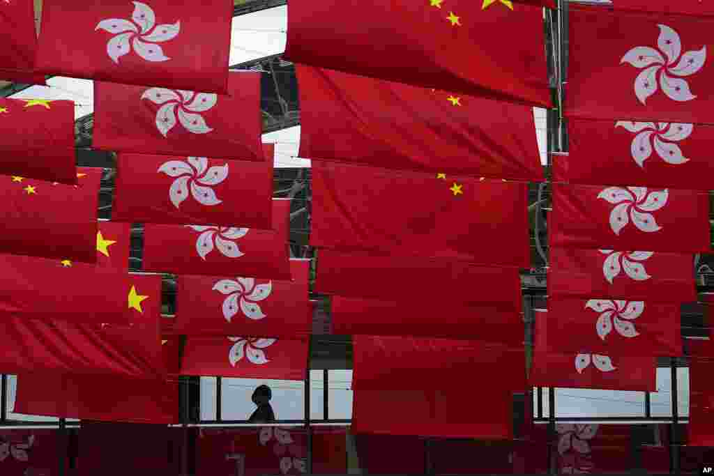 Chinese and Hong Kong flags are hanged to celebrate the 25th anniversary of Hong Kong handover to China, in Hong Kong.