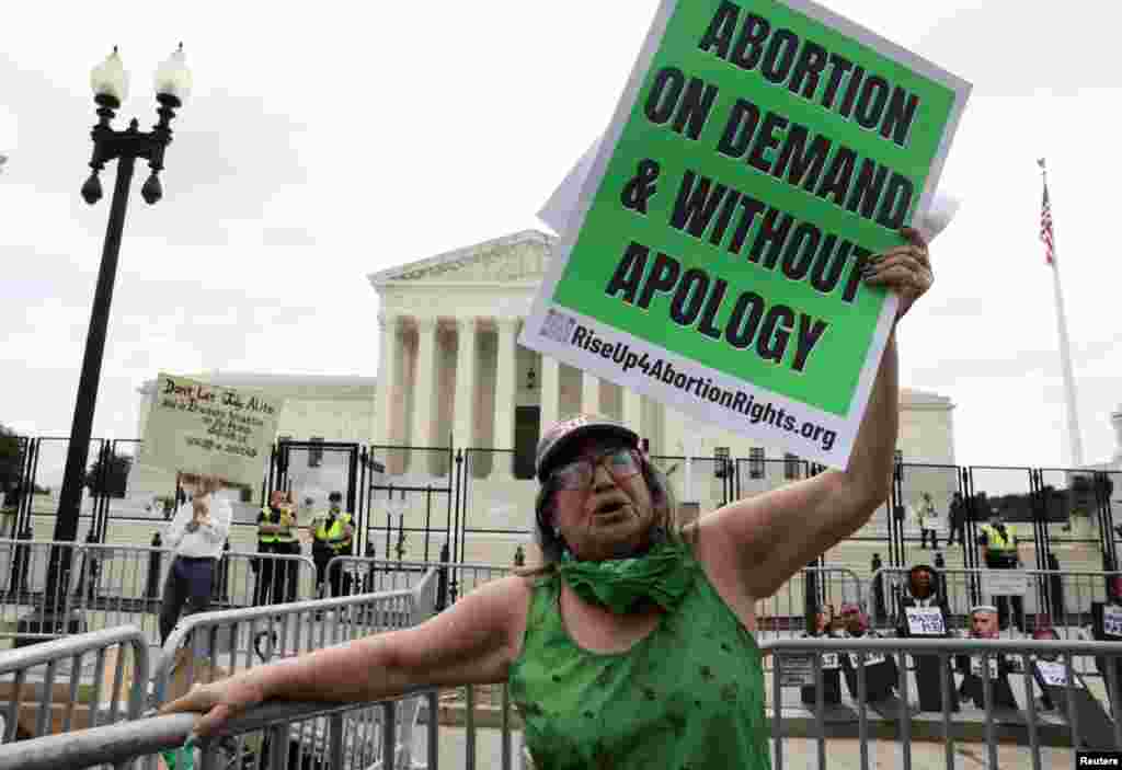 An abortion-rights demonstrator reacts outside the U.S. Supreme Court as the court overturns the landmark Roe v. Wade abortion decision in Washington.