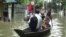 Residents of Bangladesh Navigate Flooded Streets
