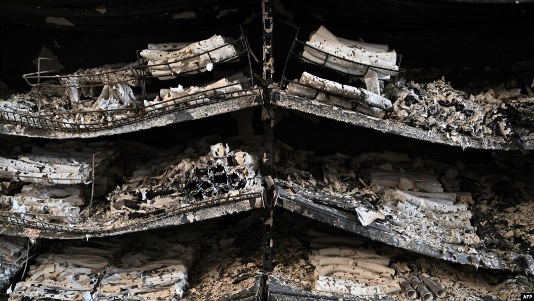 A photograph taken on June 28, 2022 shows charred goods in a grocery store of the destroyed Amstor mall in Kremenchuk, one day after it was hit by a Russian missile strike according to Ukrainian authorities.