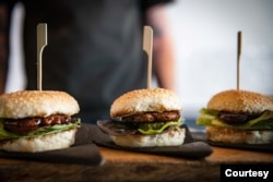 Lab-grown ground meat is used to make hamburgers. The Mzansi Meat Company is the first in South Africa to produce cultivated meat. (Photo Courtesy of Mzansi Meat Co.)