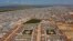 FILE - An aerial view shows a large refugee camp on the Syrian side of the border with Turkey, near Atma, in Idlib province, April 19, 2020. 