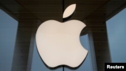 FILE: The Apple logo is seen at an Apple Store, as Apple's new 5G iPhone 12 went on sale in Brooklyn, New York, U.S. October 23, 2020. 