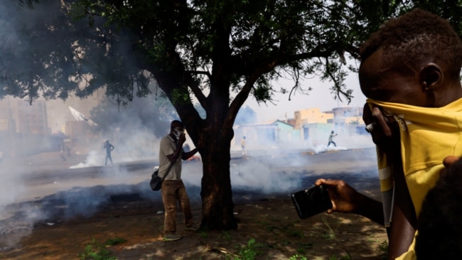 Protesters take part in a rally against the military rule that followed an October coup and to commemorate the third anniversary of demonstrations in Khartoum, Sudan, June 30, 2022.