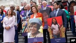 From left, Rep. Veronica Escobar, D-Texas, House Speaker Nancy Pelosi of California, and Rep. Jimmy Gomez, D-Calif., attend an event on the steps of the U.S. Capitol about gun violence, June 24, 2022. 