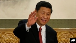 File - Chinese President Xi Jinping, pictured in a 2012 file photo, arrived Thursday in Hong Kong ahead of celebrations marking 25 years since the city was turned over from Britain to China.